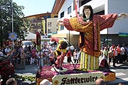 Christus Statue Rio vom Gasthof Sattlerwirt beim Ebbser Blumenkorso (©Foto. Martin Schmitz)